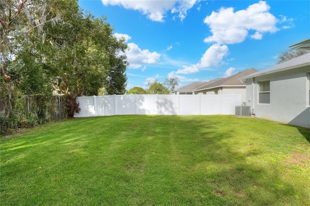 view of yard featuring central AC