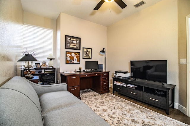 office area featuring dark hardwood / wood-style floors and ceiling fan