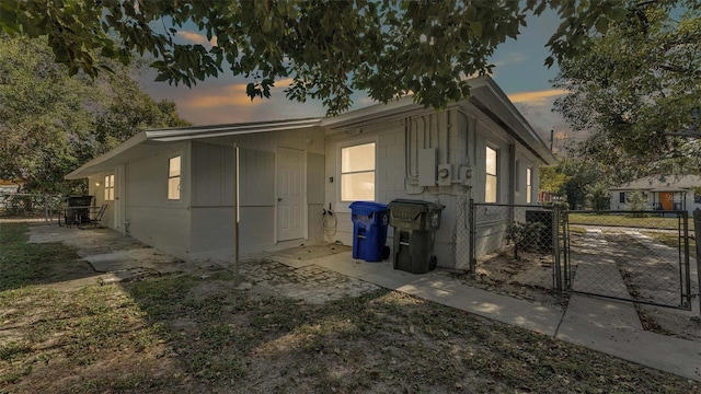 view of property exterior at dusk