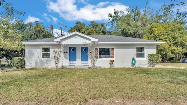 view of front facade with a porch and a front lawn