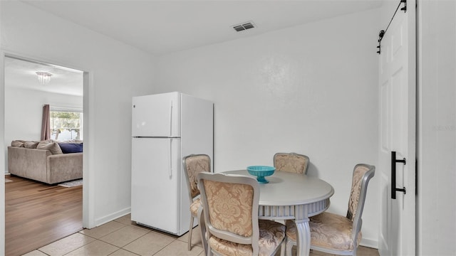 dining room with light tile patterned floors