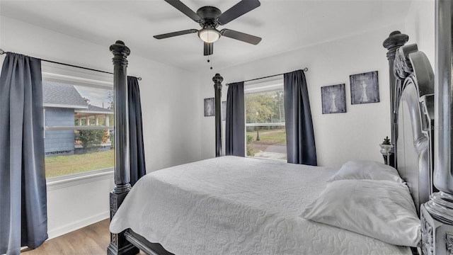 bedroom featuring ceiling fan and wood-type flooring