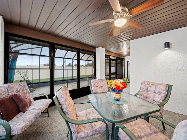 sunroom / solarium with ceiling fan