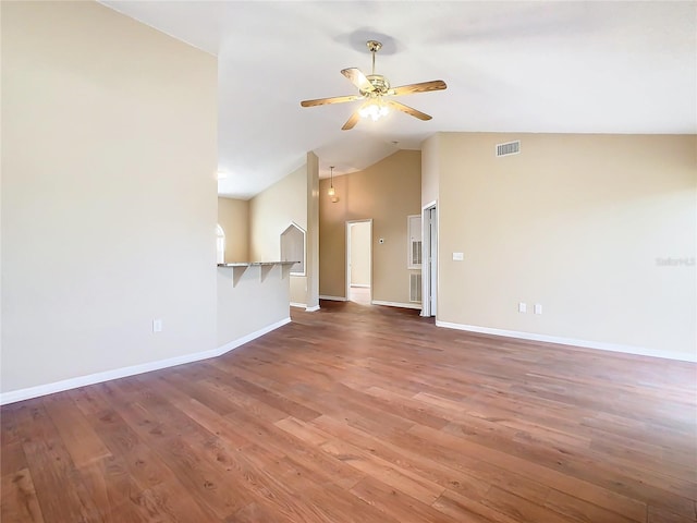 unfurnished living room featuring vaulted ceiling, ceiling fan, and dark hardwood / wood-style floors