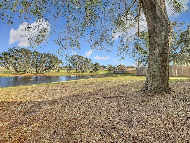 view of yard with a water view