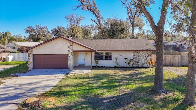 ranch-style home with a front lawn and a garage