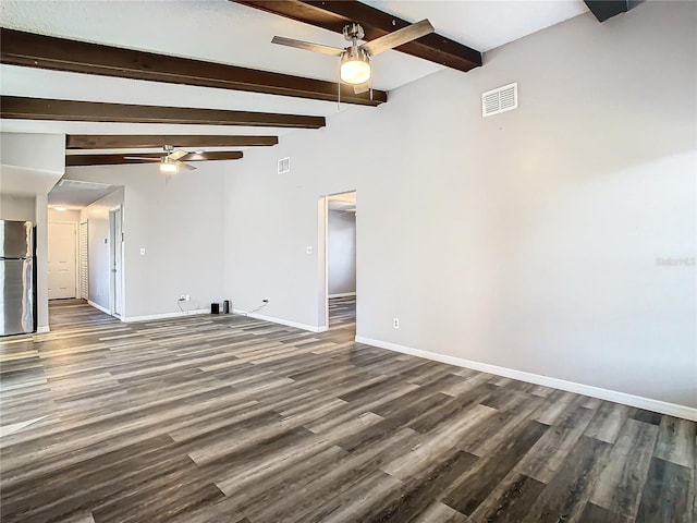 empty room with ceiling fan, beamed ceiling, and dark wood-type flooring