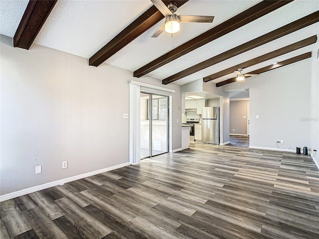 unfurnished living room featuring ceiling fan, dark hardwood / wood-style flooring, and lofted ceiling with beams