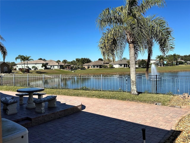 view of patio / terrace with a water view