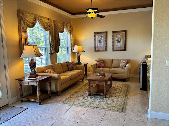 tiled living room featuring crown molding and ceiling fan