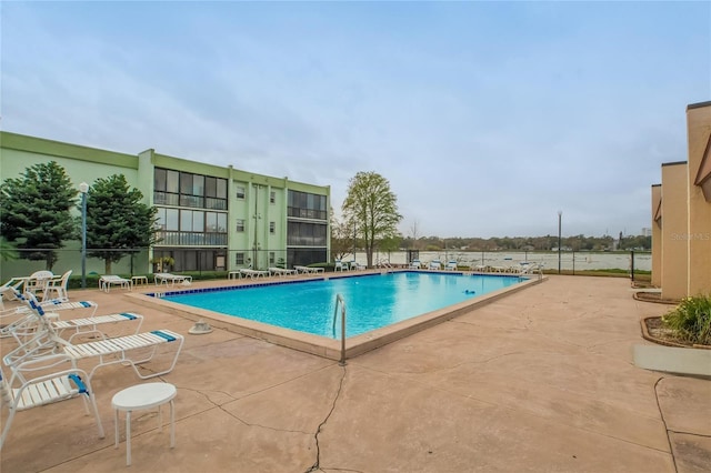 view of pool featuring a patio