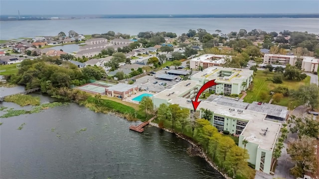 drone / aerial view with a water view