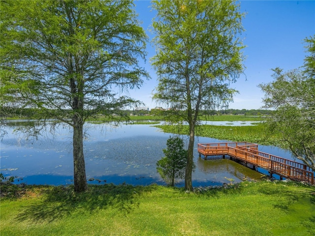 view of dock with a water view