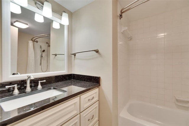 full bathroom featuring shower / bath combo and vanity