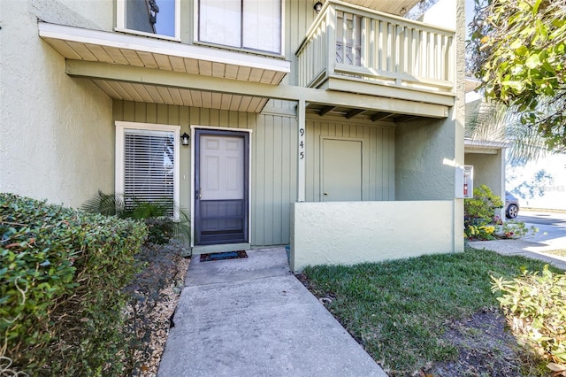 doorway to property featuring a balcony