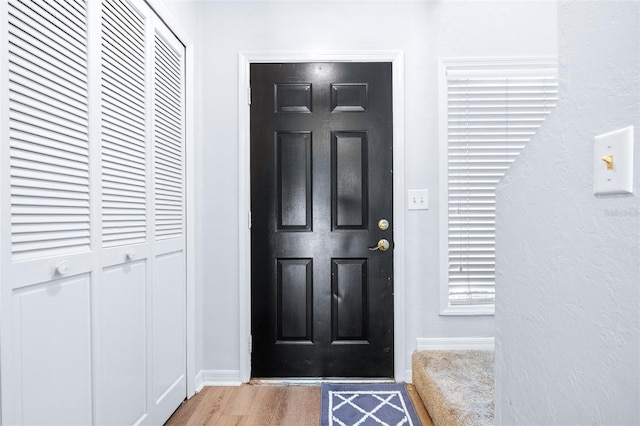 foyer featuring light hardwood / wood-style floors