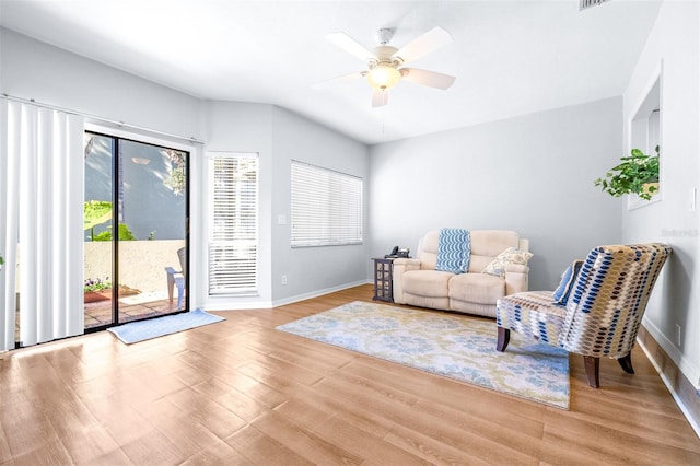 sitting room with light hardwood / wood-style flooring and ceiling fan