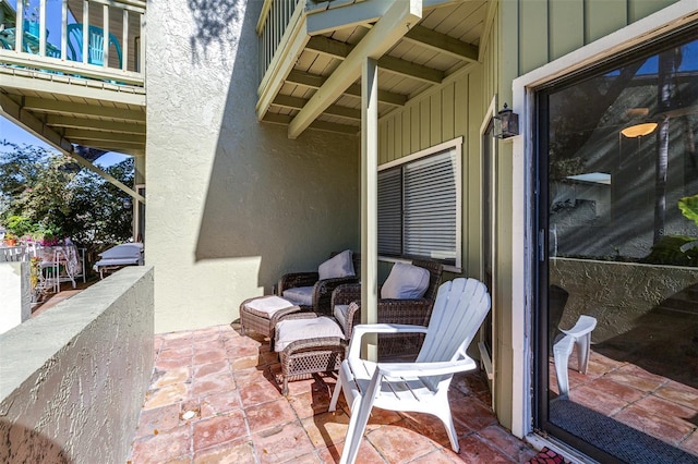 view of patio with a balcony