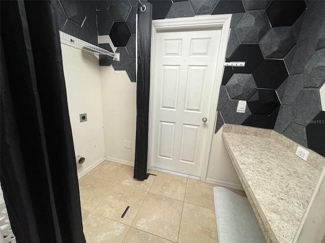 bathroom featuring tile patterned flooring