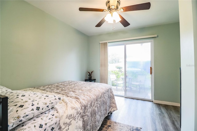 bedroom with access to exterior, ceiling fan, and hardwood / wood-style flooring