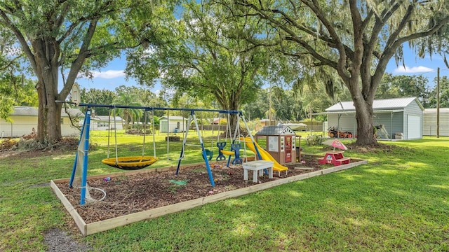 view of playground with an outbuilding and a yard