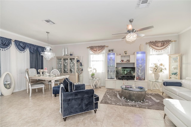 tiled living room featuring a wealth of natural light, crown molding, and ceiling fan