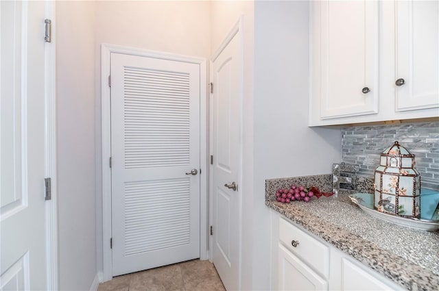 interior space featuring light tile patterned floors