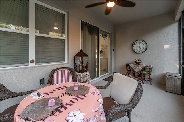 view of patio featuring ceiling fan