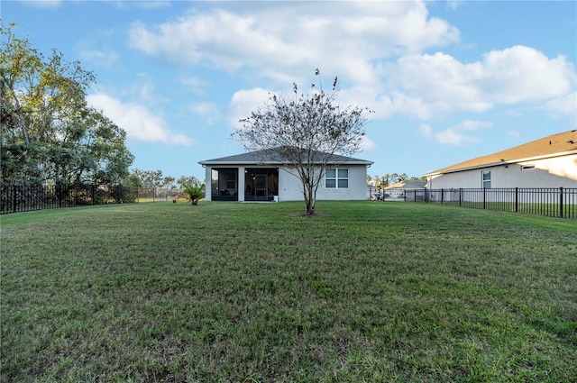 view of yard featuring a sunroom