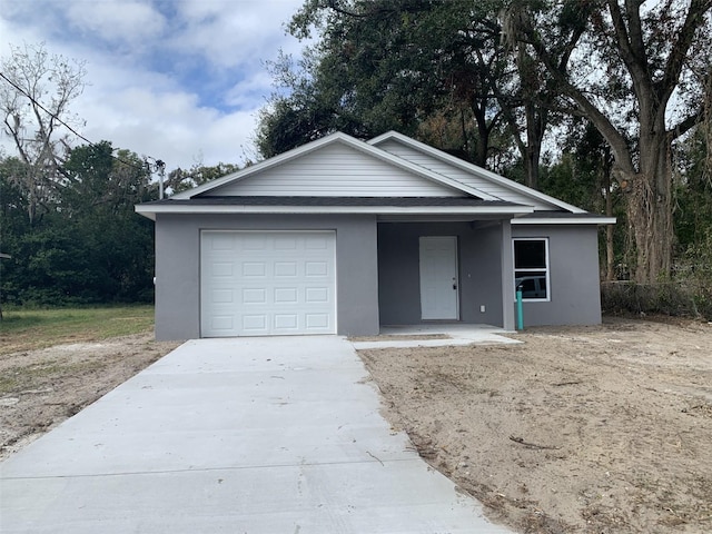 single story home with a garage