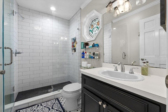 bathroom featuring an enclosed shower, vanity, crown molding, tile patterned flooring, and toilet