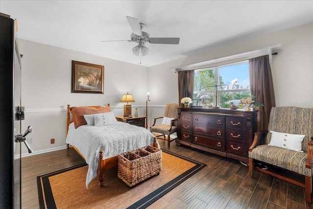 bedroom with ceiling fan and refrigerator