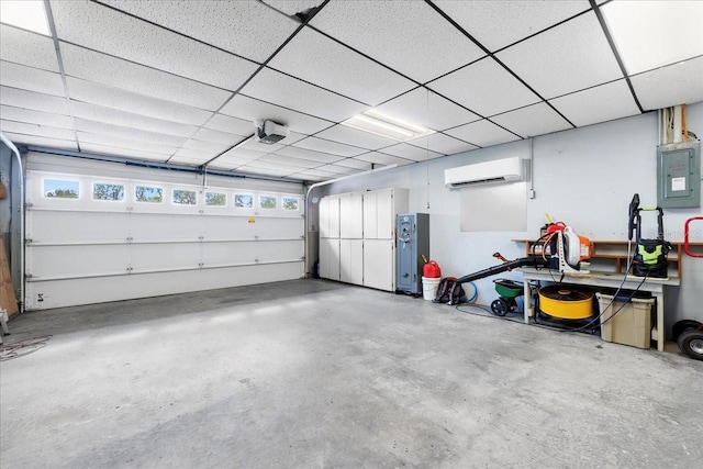 garage with electric panel, an AC wall unit, and a garage door opener