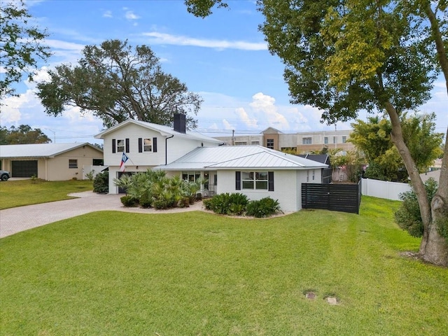 view of front facade with a front lawn