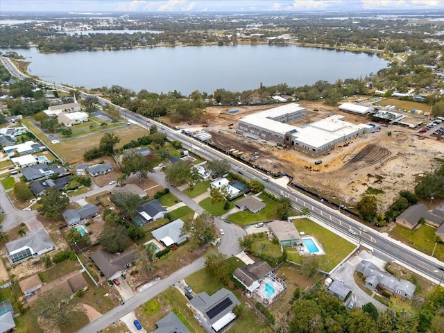 drone / aerial view with a water view