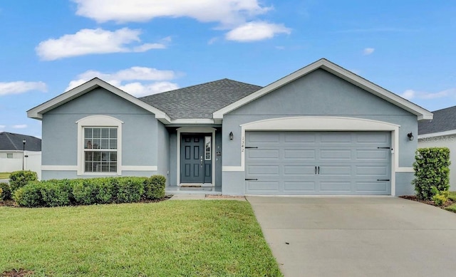 ranch-style house with a front yard and a garage