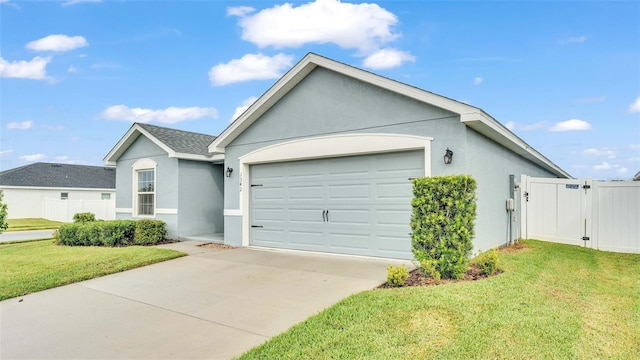 ranch-style house with a garage and a front yard