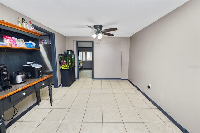 interior space featuring ceiling fan