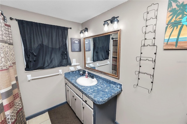 bathroom featuring vanity and tile patterned flooring