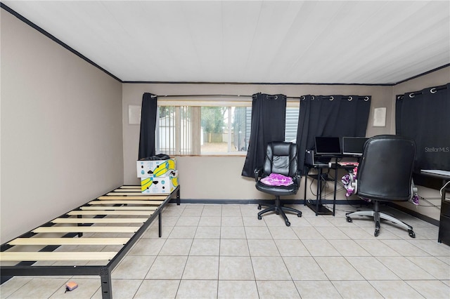 home office with light tile patterned floors and ornamental molding