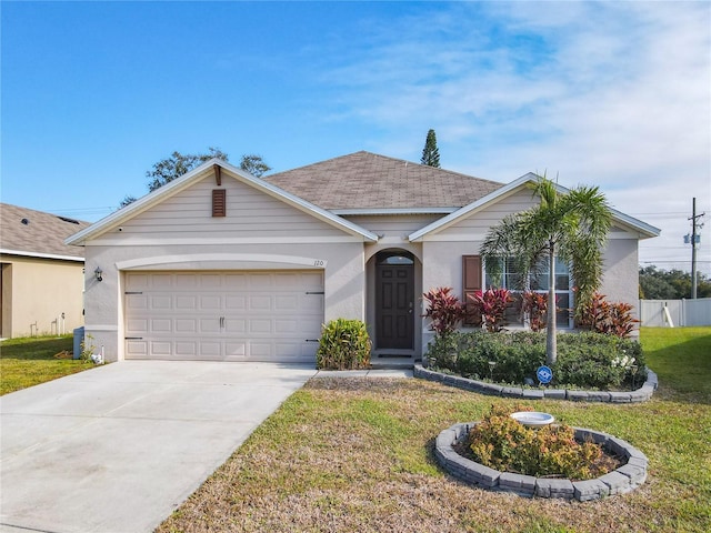 ranch-style home featuring a front yard and a garage