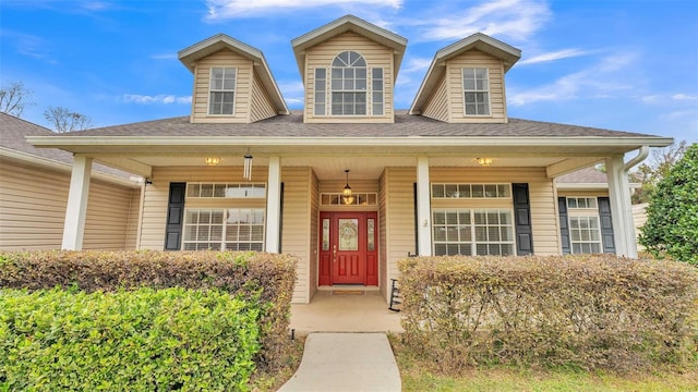 doorway to property featuring a porch