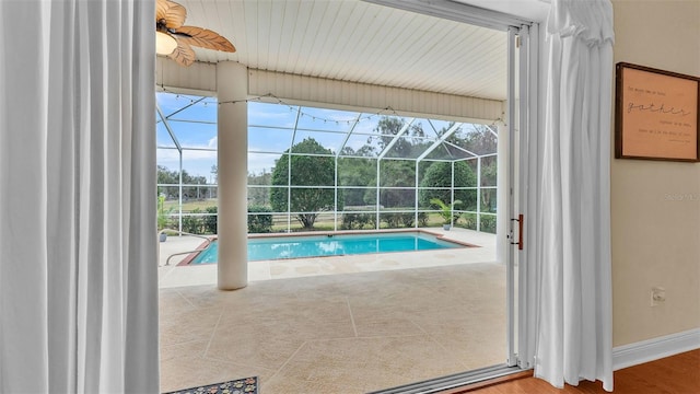 view of swimming pool with ceiling fan