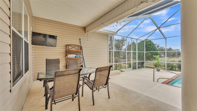 view of patio / terrace with a lanai