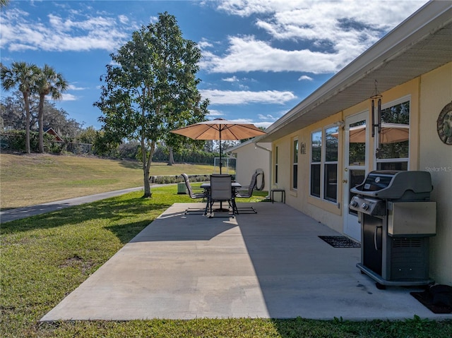 view of patio featuring outdoor dining area and grilling area