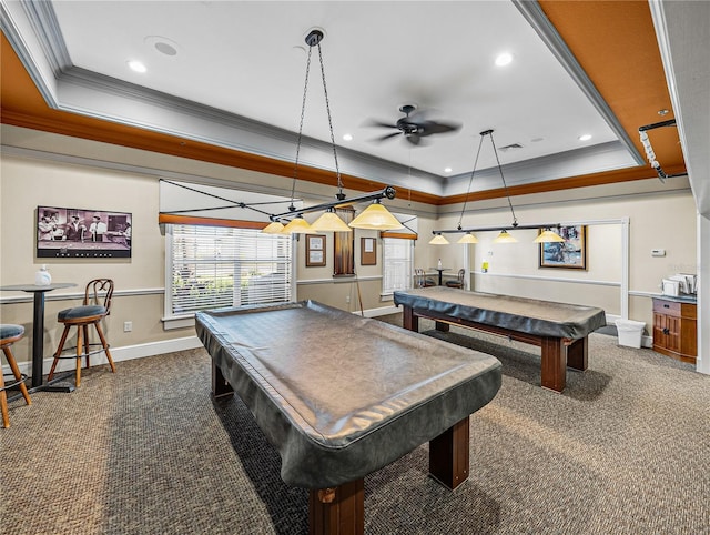 game room featuring pool table, ornamental molding, dark colored carpet, and a wealth of natural light