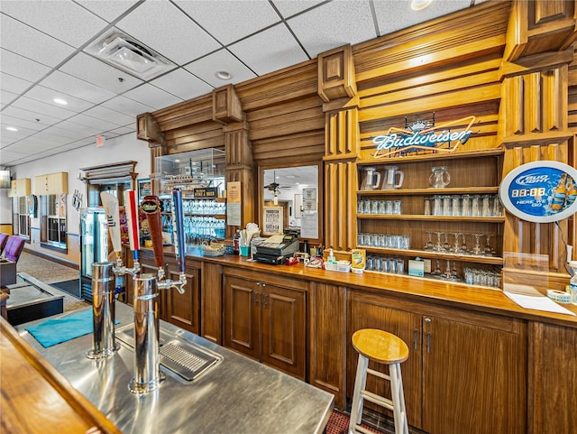 bar with a ceiling fan, recessed lighting, visible vents, and a drop ceiling