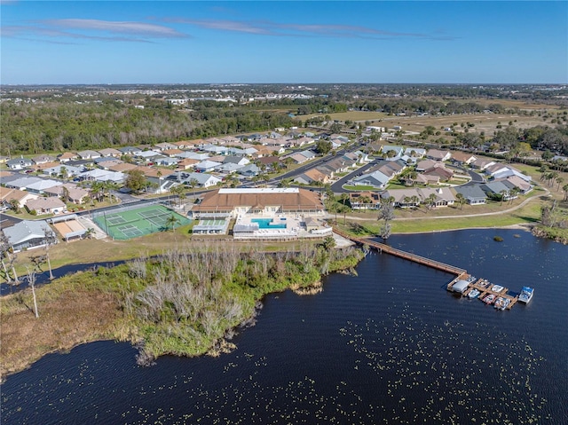 bird's eye view with a water view and a residential view