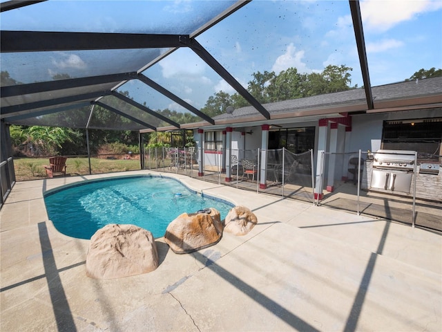 view of swimming pool featuring a patio, glass enclosure, and area for grilling