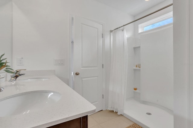 bathroom featuring vanity, tile patterned floors, and a shower with shower curtain